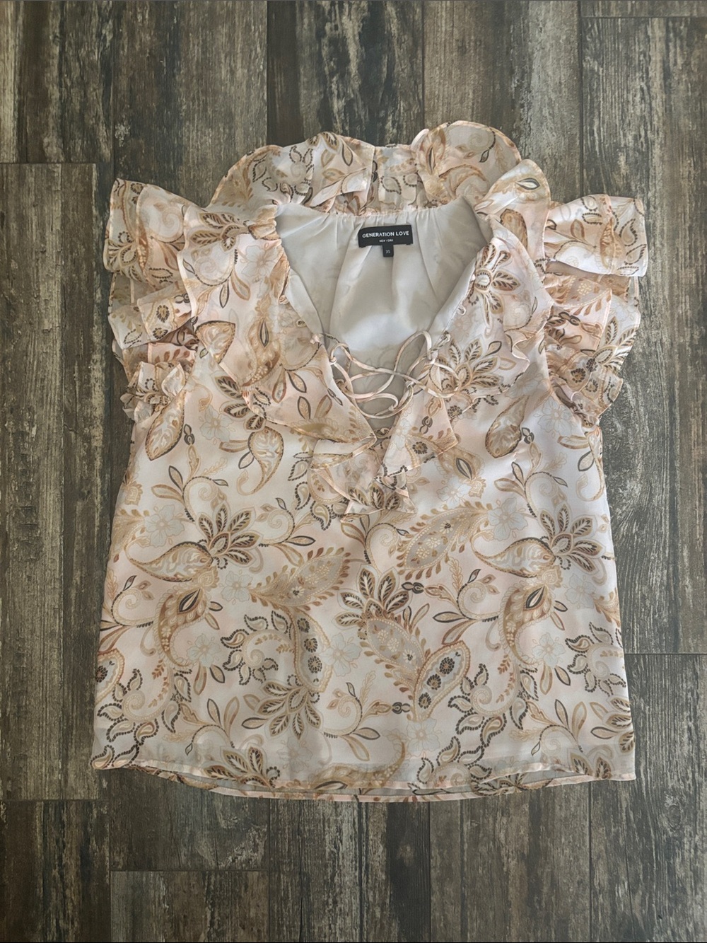 Generation Love Sheer Paisley Ruffle Lace-Up Blouse in Cream and Gold